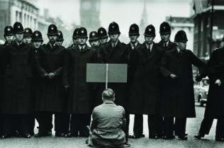 A-lone-anti-war-protester-confronts-police-in-Whitehall-during-the-Cuban-Missile-Crisis-London-1962-460x300