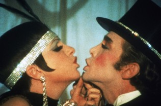 This 1972 photo released by Warner Bros. Home Video shows Liza Minnelli as Sally Bowles, left, and Joel Grey as Master of Ceremonies in a scene from "Cabaret."  The landmark film "Cabaret", starring Liza Minnelli, Joel Grey and Michael York, has turned 41. All three actors will be attending an anniversary celebration screening planned Thursday, Jan. 31, 2013, at the Ziegfeld Theatre, where the movie first premiered in 1972. (AP Photo/Warner Bros. Home Video)